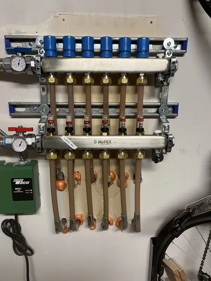 Plumber performing Leak Detection at a residential property in Vienna